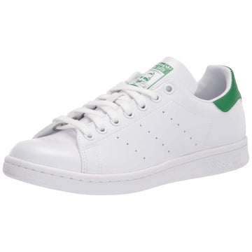 White sneaker with green accents on a white background