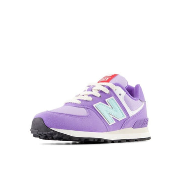 Purple sneaker with a brand logo on a white background