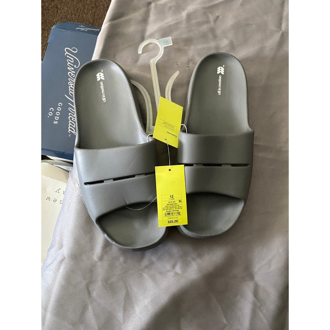 Gray slide sandal on a white background