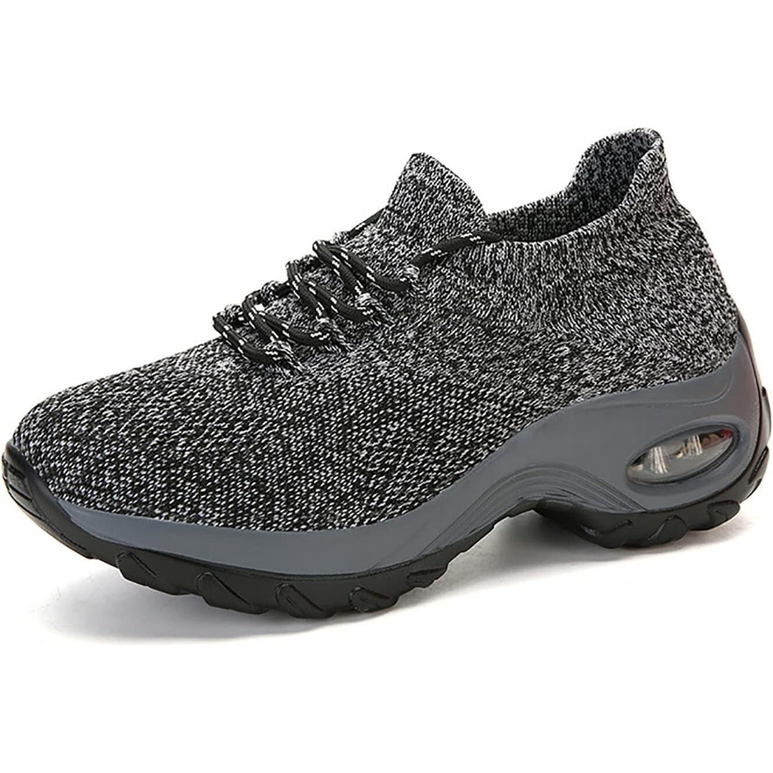 Gray athletic shoe with textured upper and black sole on a white background