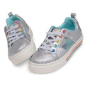 Silver glitter sneakers with colorful accents on a white background